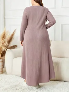 Plus size ribbed knit maxi dress back view detail, soft mauve long sleeve casual outfit style.