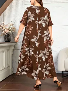 Back detail of floral print plus-size summer dress with ruffle sleeves and vintage style.