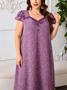 Close-up detail of plus size purple floral midi dress, square neck with lace and buttons.