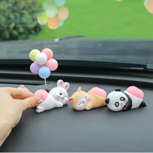 Cute cartoon animal car dashboard ornaments featuring funny squishy pink peach butt design.
