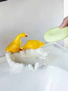 Cute ceramic duck soap dish, creative cloud-shaped soap tray for bathroom home decor.