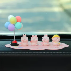 Cute mini pig car dashboard ornament set with colorful balloons and lovely non-slip mat.