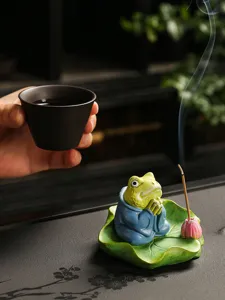 Close-up detail of the ceramic frog incense burner, showing exquisite handmade texture and Zen vibe.