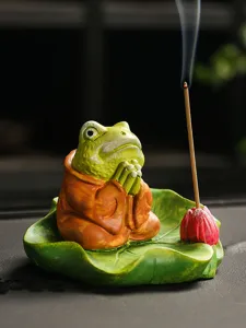 Zen frog incense holder detail view showing the meditating frog and lotus leaf burner design.