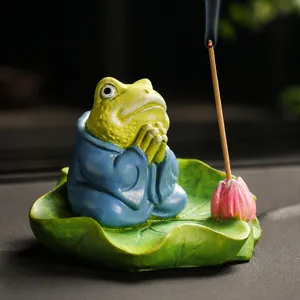 Detailed shot of the zen frog incense burner, showing exquisite craftsmanship and meditation pose.