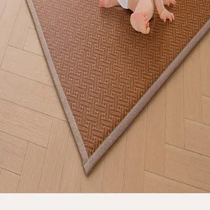 Detailed view of the summer cooling rattan mat with fine woven texture and soft border.