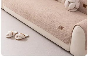 Plush sofa cushion fabric detail, textured thick material, cozy winter home decor closeup.