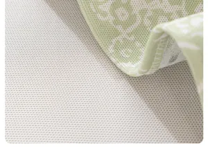 Ice silk sofa cushion detail, green patterned fabric with anti-slip backing for summer.