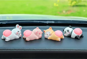 Cute animal car dashboard ornaments, resin cartoon bunny and panda figurines for auto interior.