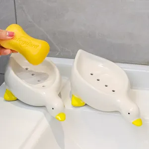 Joli porte-savon canard en céramique pour la salle de bain, design d'animal mignon.