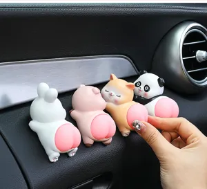 Detailed close-up of cute cartoon animal butt squeeze toy for car interior decoration setup.