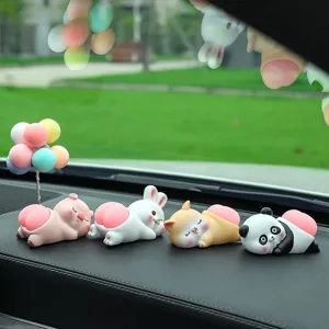 Cute animal car dashboard ornament set featuring pig rabbit cat and panda with peach design.