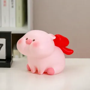 Süßes rosa Sparschwein mit rotem Flügel, vinyl bruchsicherer Münzbehälter, kreatives Geschenk für Kinder.