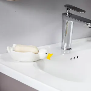 Joli porte-savon en céramique en forme de canard pour lavabo de salle de bains, élégant.