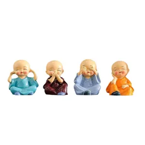 Ensemble de quatre mignonnes petites figurines de moines pour table à thé ou déco.