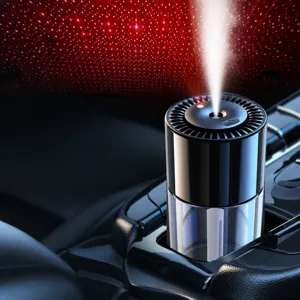 Car air humidifier diffuser with starry sky light projection and mist spray for auto interior.