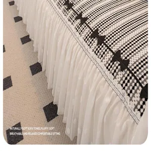 Chenille sofa cover featuring black white grid, mesh lace skirt and cute bows for room decor.