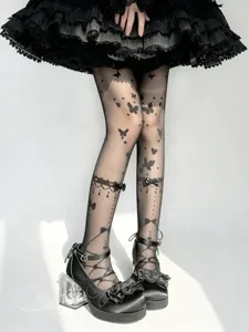 Black sheer Lolita tights with butterfly print and bow details close-up shot for cute style.
