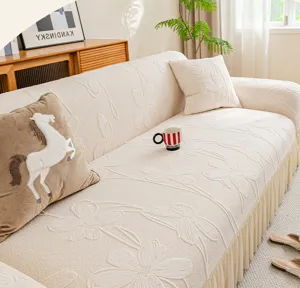 Beige jacquard sofa cover with elegant floral texture and delicate skirt design for living room.
