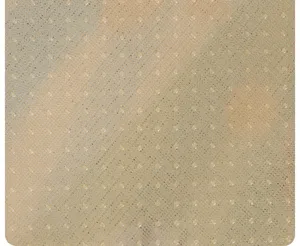 Gros plan détaillé du tissu de support antidérapant en silicone pour coussin de canapé.