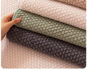 Close-up detail of thick plush sofa cushion winter warm anti-slip fabric texture showcase.