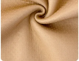 Close-up detail of thickened anti-slip sofa cushion fabric texture with silicone grip dots.