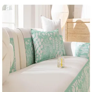 Summer ice silk sofa cover detail, fresh green floral pattern, anti-slip fabric protection.