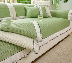 Ice silk waffle sofa cover mat with elegant lace ruffle design for summer cooling home decor.