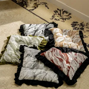 French vintage style chair cushion with leaf print and black ruffles, soft seat pad for dining.