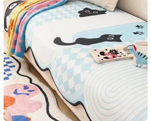 Summer ice silk cartoon sofa mat detail view, cool feeling anti-slip cover with cute cat print.