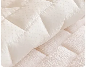 Corduroy sofa cushion detail shot showing anti-slip silicone particles and soft quilted fabric texture