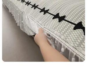 Ice silk sofa cushion detail, cooling mat with elegant black bows and mesh ruffle skirt.