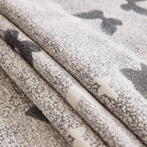 Grey printed fabric sofa cover material close up texture elegant home textile design