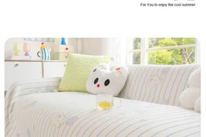Detail view of the summer cooling ice silk sofa cover featuring cute cartoon patterns.