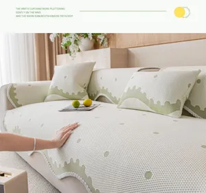 Detailed close-up view of the summer cooling ice silk sofa cover featuring cute polka dot pattern.