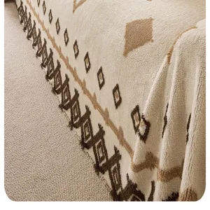 Soft plush sofa cover detail, cozy bohemian geometric pattern, warm home textile fabric.