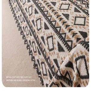 Close-up detail of retro style chenille sofa cover showing soft geometric texture and fine weave.
