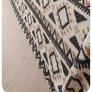 Retro chenille sofa cover blanket with boho geometric pattern. Soft four-season couch slipcover.