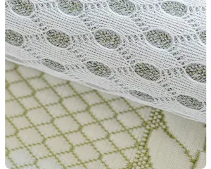 Close-up detail of summer cooling sofa cushion mesh fabric, breathable ice silk material.