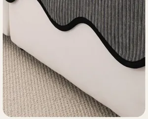 French style chenille sofa pad close-up detail, grey striped fabric with black wavy edge.