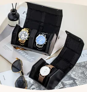Premium black velvet watch box detail view showing elegant multi-slot travel storage organizer.