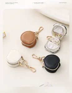 Portable mini round jewelry box bag pendant, cute travel earring ring storage case keychain.