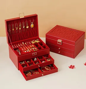 Multi-layer leather jewelry box with large capacity, drawers and hooks for necklaces and rings.