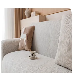 Jacquard plush sofa cover detail showing soft textured fabric and elegant home decor setup.