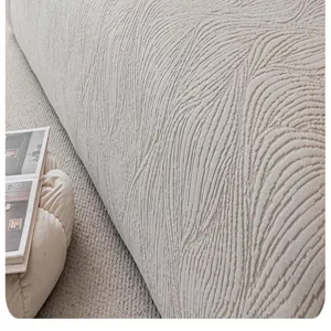 Detail view of beige jacquard velvet sofa cover, showing soft textured fabric design.