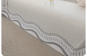 Cooling sofa cover detail showing smooth fabric texture and modern wave pattern for summer.