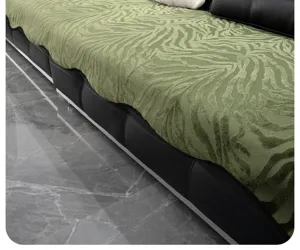 Green chenille zebra pattern sofa cushion detail view, soft fabric texture close up for modern decor