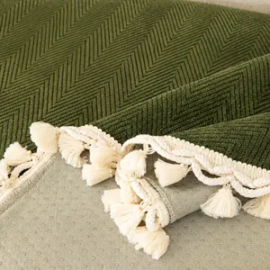 Vintage green chenille sofa cushion with elegant white fringe tassels and anti-slip backing