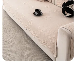 Detalle de funda de sofá estilo crema francesa, tela cuatro estaciones lazo bordado.