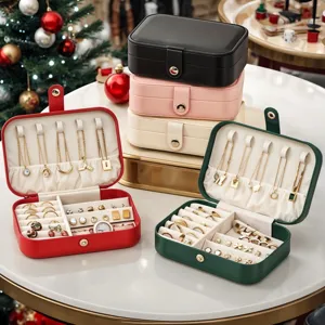 Detailed view of multi-color PU leather portable jewelry box with ring, necklace and earring slots.